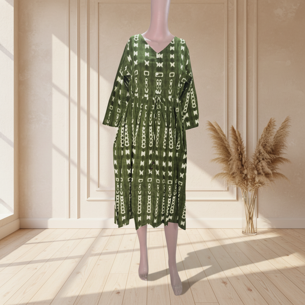 Olive green cotton one piece with cream geometric print, gathered waist and side pocket