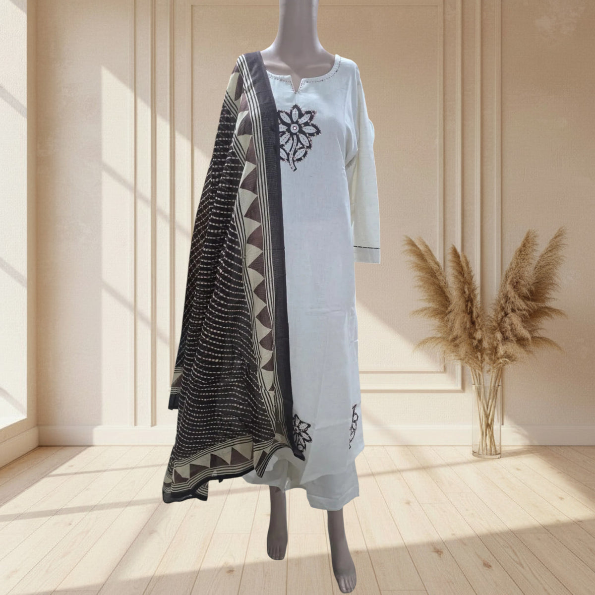 Cream A-line handloom cotton kurti with brown floral motifs, notched neckline and side pockets