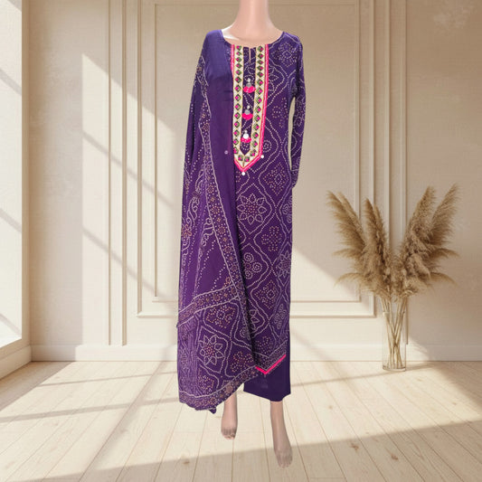 Purple cotton kurti with multicolour embroidered yoke, pink tassels and pink hem border