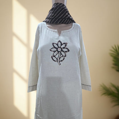 Brown Kota Doriya dupatta with striped pattern and triangle border, paired with cream cotton suit